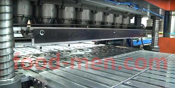 Metal cans ends making machines line Figure 3 -- Double row die (16 dies in total)